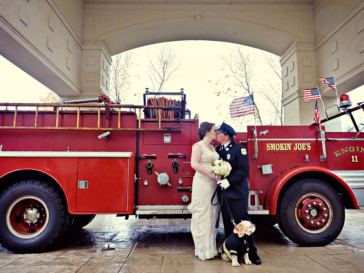 Wedding-Firefighter-Windy-Kiss-with-dog-Bridal-Portrait.jpg