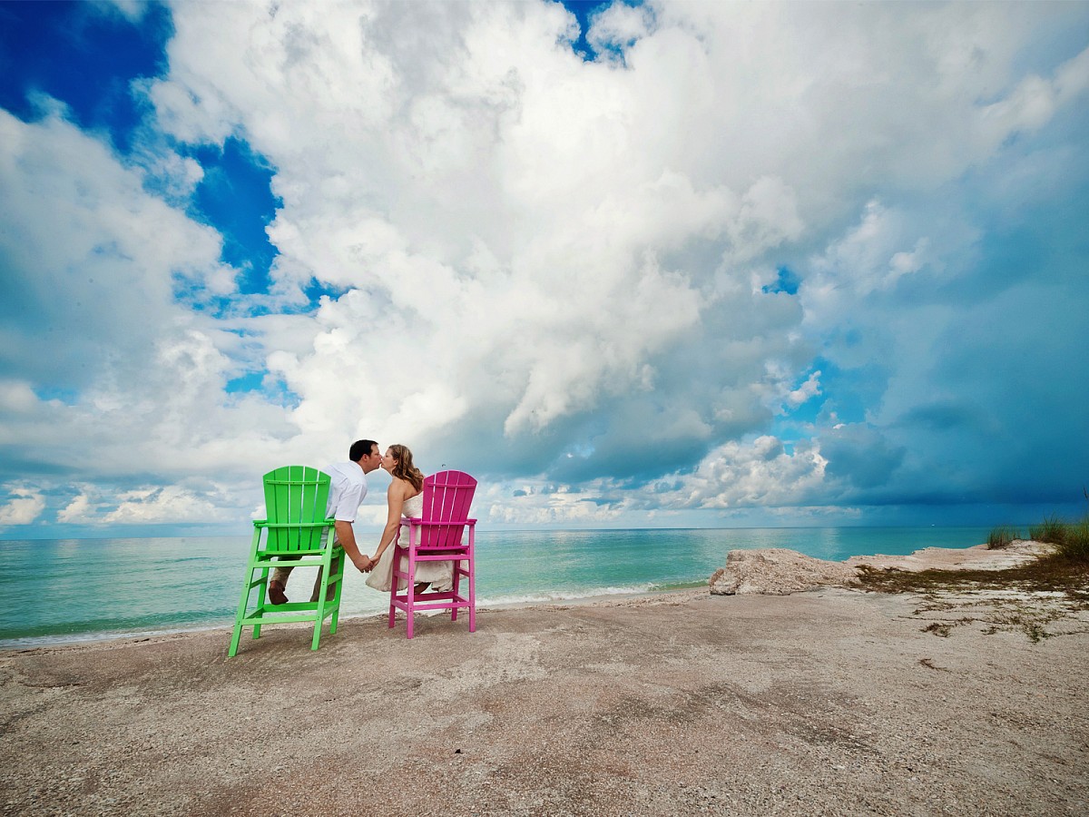 Weddings-Destination-Florida-Beach-Chairs-Kiss-Bridal-Portrait.jpg